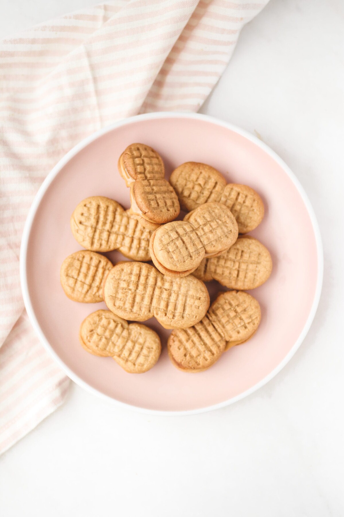 nutter butter cookies on a pink plate