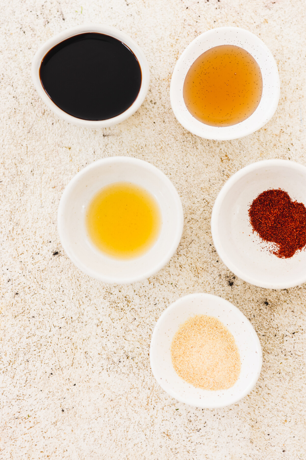 marinade ingredients in small bowls