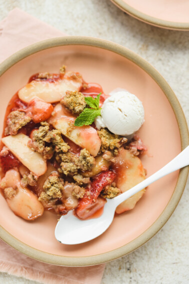 strawberry peach cobbler on a plate