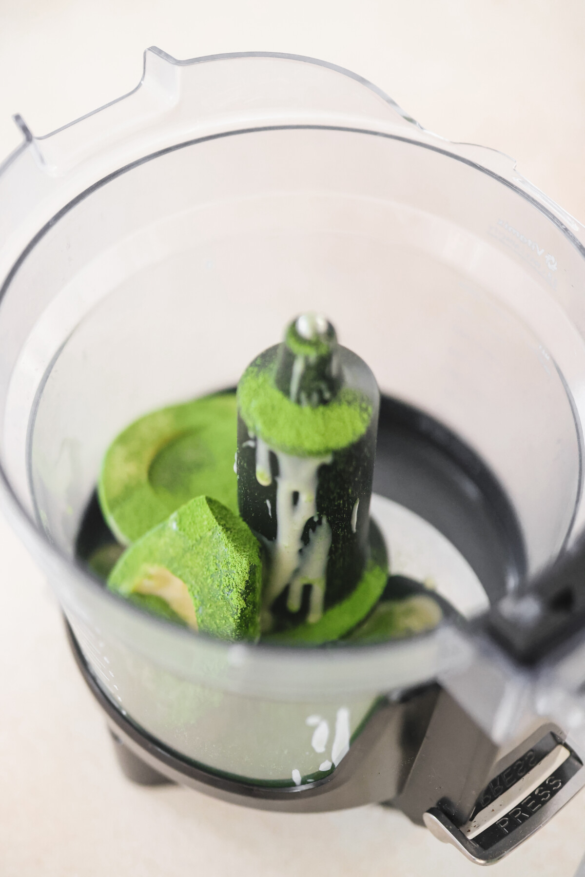 a food processor filled with matcha mousse recipe ingredients 