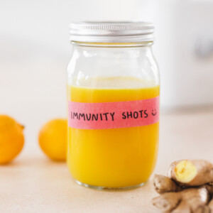 a mason jar filled with immunity shot recipe